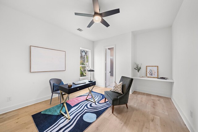 431 Neyland St, Houston, TX 77022 - office with light wood-style floors, ceiling fan, and baseboards