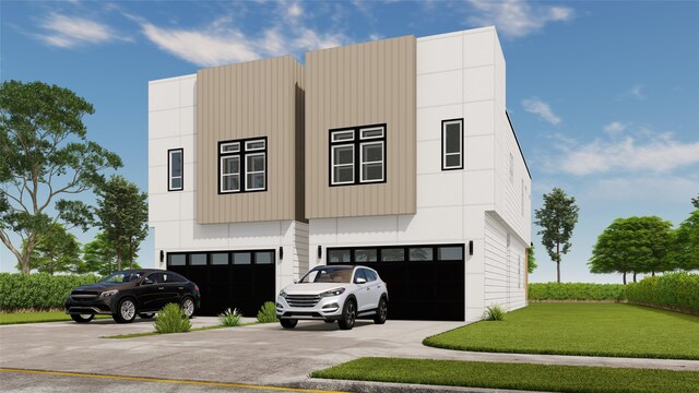 431 Neyland St, Houston, TX 77022 - view of front of property featuring driveway, a garage, and a front yard