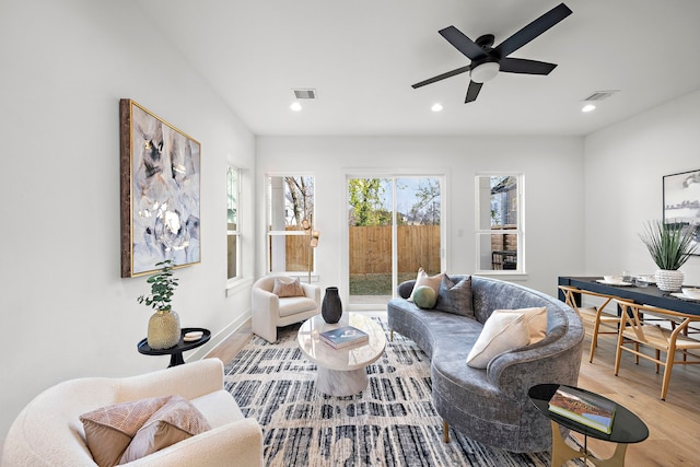 431 Neyland St, Houston, TX 77022 - living room with wood finished floors, recessed lighting, a ceiling fan, and baseboards
