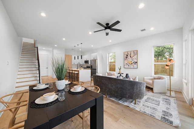 431 Neyland St, Houston, TX 77022 - dining room featuring plenty of natural light, ceiling fan, recessed lighting, and light wood-type flooring