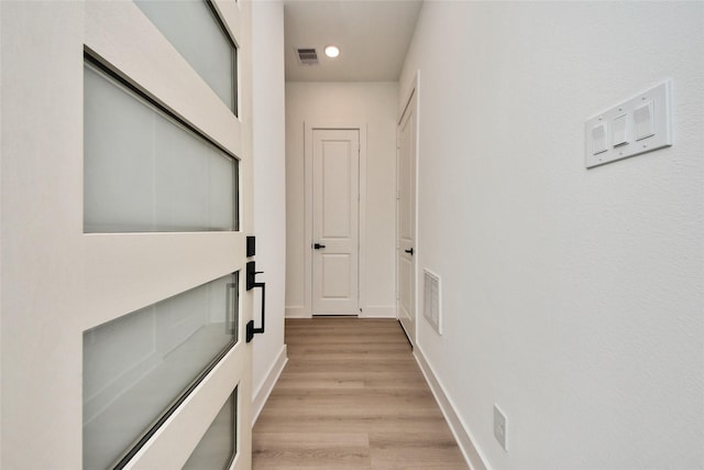 431 Neyland St, Houston, TX 77022 - hall with light wood finished floors and recessed lighting