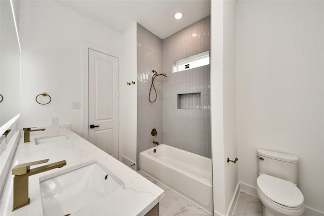 431 Neyland St, Houston, TX 77022 - bathroom featuring double vanity, bathing tub / shower combination, marble look tile flooring, and recessed lighting