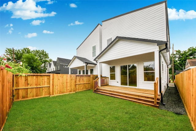 431 Neyland St, Houston, TX 77022 - rear view of house with a fenced backyard and a deck