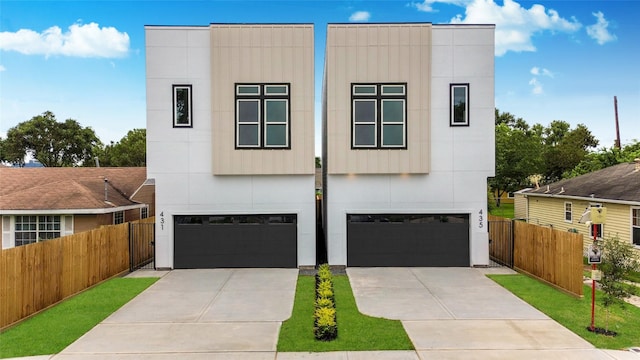 431 Neyland St, Houston, TX 77022 - modern home with driveway and an attached garage