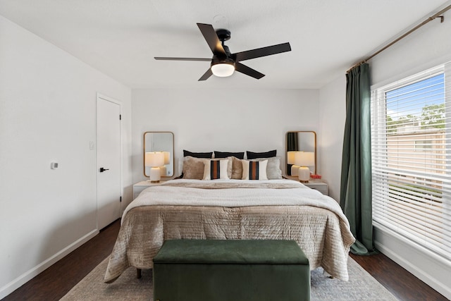 1115 Augusta Dr Unit 8, Houston, TX 77057 - bedroom featuring dark wood-style flooring, baseboards, and ceiling fan