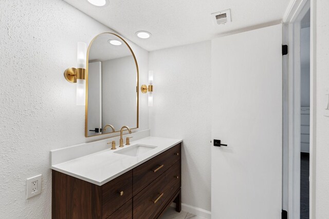 1115 Augusta Dr Unit 8, Houston, TX 77057 - bathroom featuring vanity and baseboards
