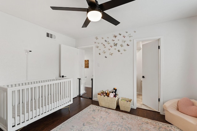 1115 Augusta Dr Unit 8, Houston, TX 77057 - bedroom featuring wood finished floors, a nursery area, and ceiling fan