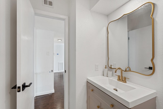 1115 Augusta Dr Unit 8, Houston, TX 77057 - bathroom featuring vanity and wood finished floors