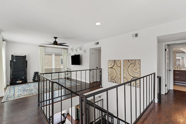 1115 Augusta Dr Unit 8, Houston, TX 77057 - corridor with an upstairs landing, dark wood-style floors, baseboards, and recessed lighting