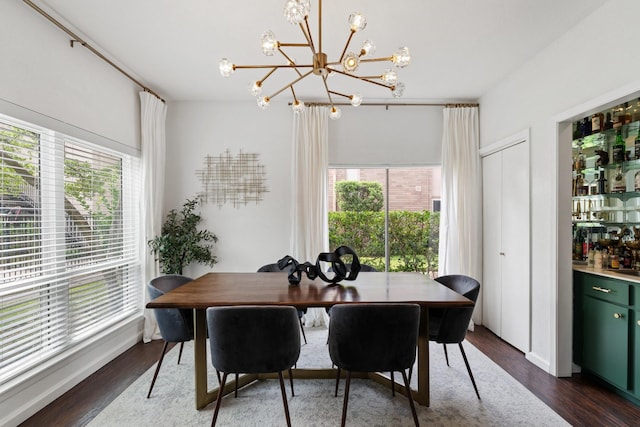 1115 Augusta Dr Unit 8, Houston, TX 77057 - dining room with a chandelier, dark wood finished floors, and bar area