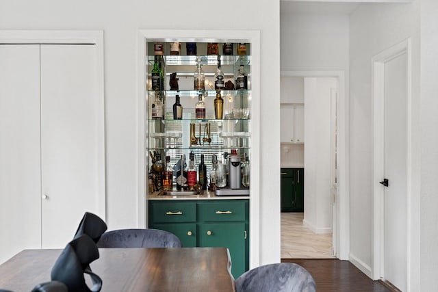 1115 Augusta Dr Unit 8, Houston, TX 77057 - indoor dry bar featuring dark wood-style flooring and baseboards