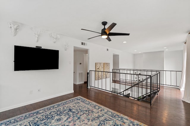 1115 Augusta Dr Unit 8, Houston, TX 77057 - hall with an upstairs landing, wood finished floors, baseboards, and recessed lighting