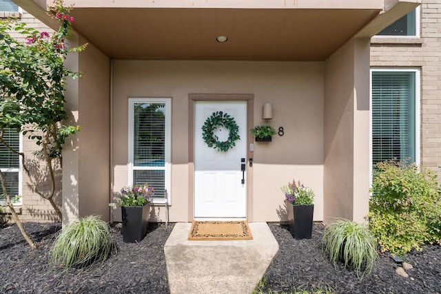 1115 Augusta Dr Unit 8, Houston, TX 77057 - view of exterior entry featuring stucco siding
