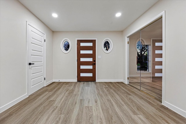 8902 Hendon Ln, Houston, TX 77036 - foyer featuring wood finished floors, baseboards, and recessed lighting