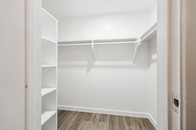8902 Hendon Ln, Houston, TX 77036 - spacious closet featuring wood finished floors