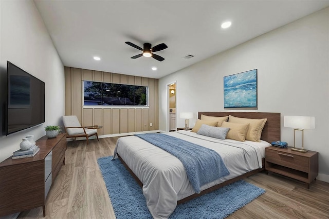 8902 Hendon Ln, Houston, TX 77036 - bedroom featuring wood finished floors, recessed lighting, baseboards, and a ceiling fan