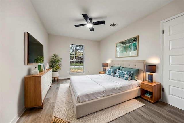 8902 Hendon Ln, Houston, TX 77036 - bedroom with wood finished floors, baseboards, and a ceiling fan