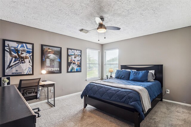 1703 Lakewinds Dr, Missouri City, TX 77459 - bedroom with carpet flooring, baseboards, a ceiling fan, an office area, and a textured ceiling
