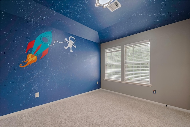 9968 Tallow Pointe Ln, Brookshire, TX 77423 - empty room with carpet, baseboards, and vaulted ceiling