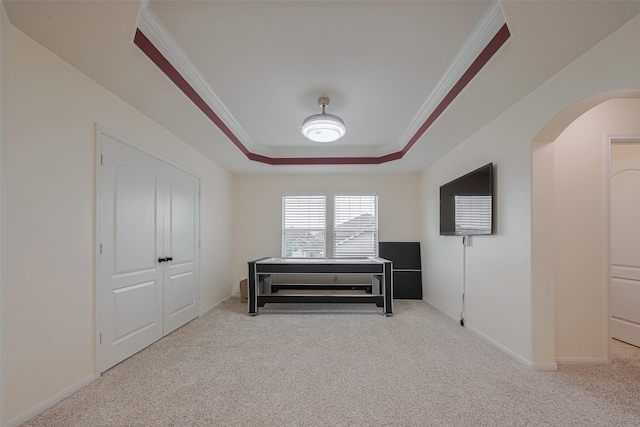 9968 Tallow Pointe Ln, Brookshire, TX 77423 - bedroom featuring carpet, a raised ceiling, ornamental molding, arched walkways, and baseboards