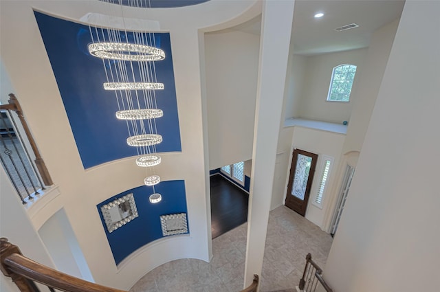 9968 Tallow Pointe Ln, Brookshire, TX 77423 - foyer entrance featuring a chandelier, a towering ceiling, and recessed lighting