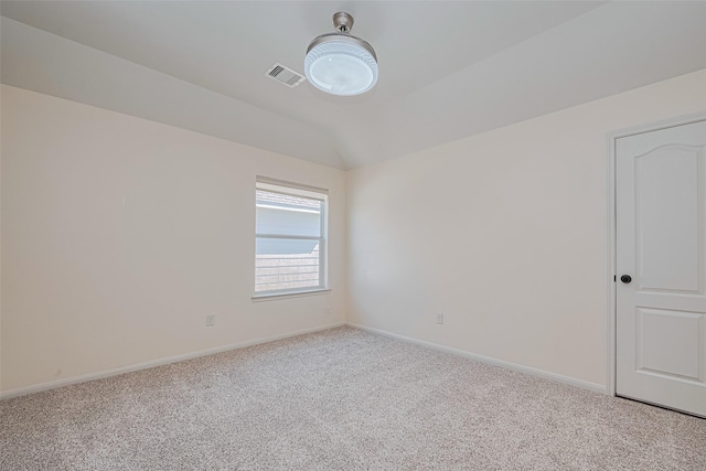 9968 Tallow Pointe Ln, Brookshire, TX 77423 - empty room with light carpet, lofted ceiling, and baseboards