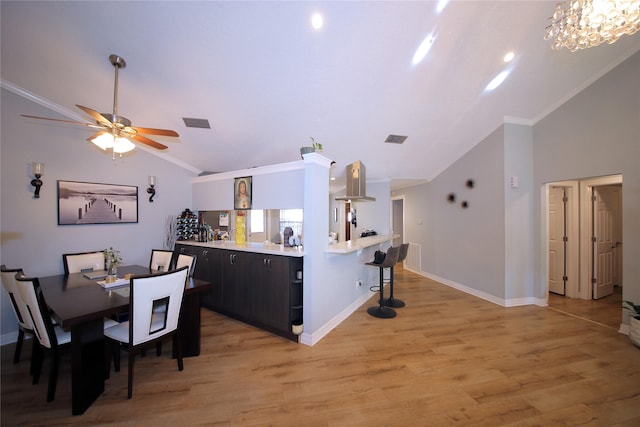 3726 Straightfork Dr, Houston, TX 77082 - dining space featuring lofted ceiling, light wood finished floors, ceiling fan, ornamental molding, and baseboards