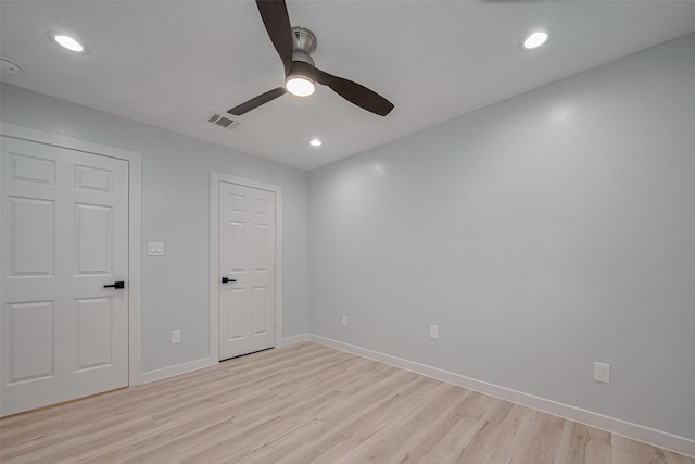 unfurnished bedroom featuring light wood-style flooring, baseboards, a ceiling fan, and recessed lighting