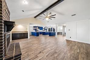 15418 Windy Cove Dr, Houston, TX 77095 - unfurnished living room with a fireplace, a ceiling fan, and wood finished floors