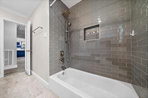 15418 Windy Cove Dr, Houston, TX 77095 - bathroom featuring ornamental molding, baseboards, and shower / bathtub combination