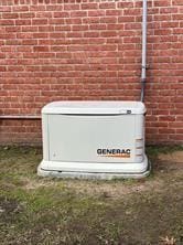 15418 Windy Cove Dr, Houston, TX 77095 - exterior view of a power unit and brick siding
