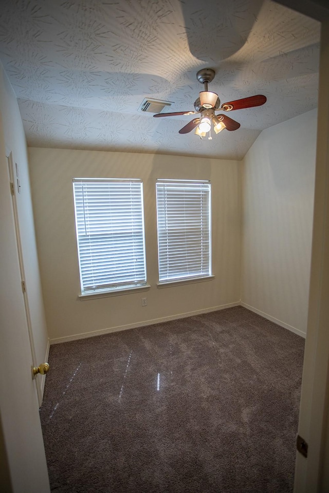 21926 Crestworth Ln, Katy, TX 77449 - carpeted spare room with ceiling fan, baseboards, and lofted ceiling