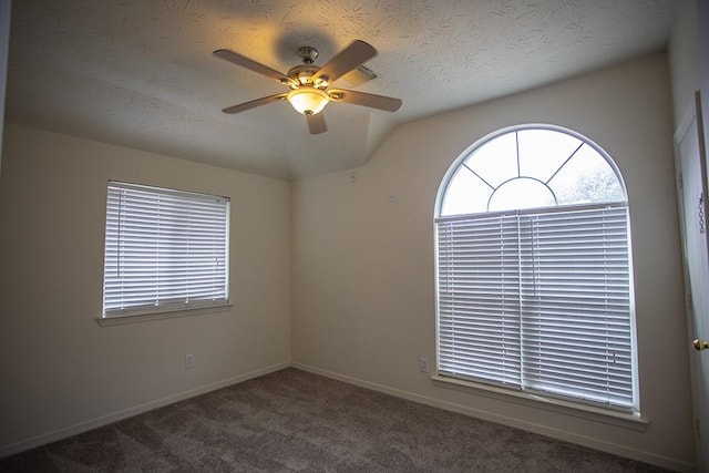21926 Crestworth Ln, Katy, TX 77449 - carpeted empty room featuring ceiling fan, vaulted ceiling, and baseboards