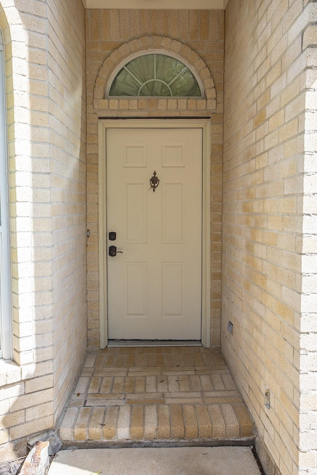21926 Crestworth Ln, Katy, TX 77449 - view of exterior entry featuring brick siding