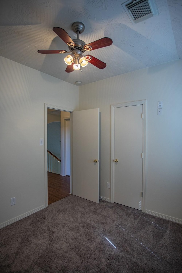 21926 Crestworth Ln, Katy, TX 77449 - unfurnished bedroom with carpet floors, baseboards, and a ceiling fan