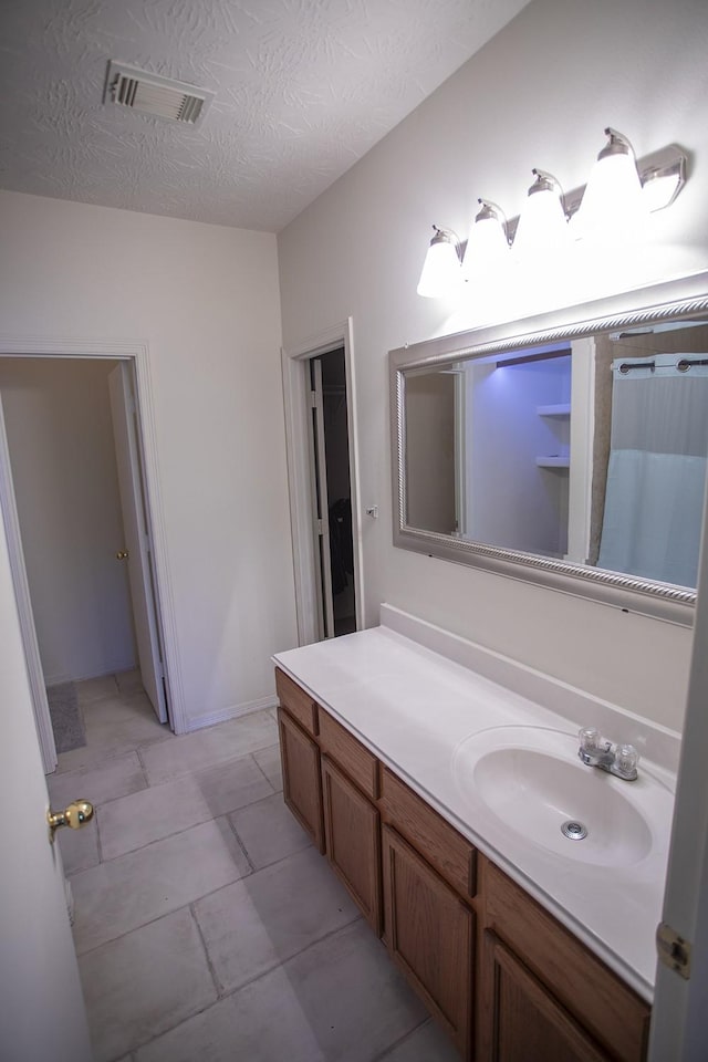 21926 Crestworth Ln, Katy, TX 77449 - bathroom with vanity and tile patterned flooring