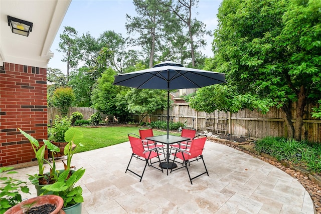 view of patio with outdoor dining area