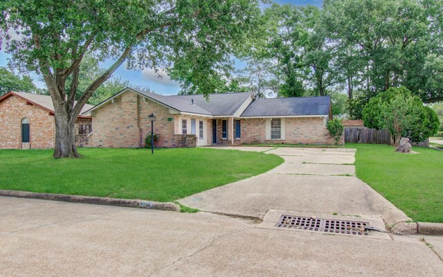 9502 Kell Cir, Houston, TX 77040 - ranch-style house featuring driveway and brick siding