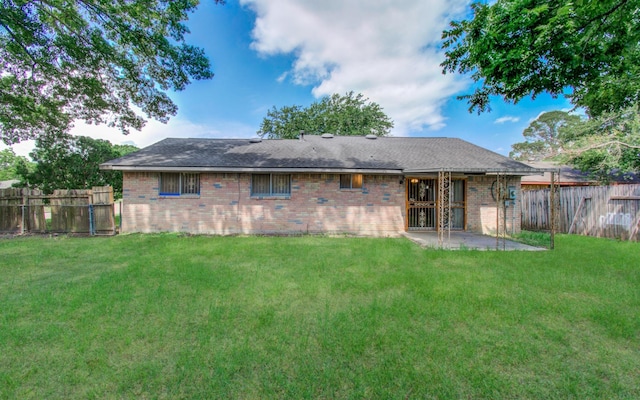 9502 Kell Cir, Houston, TX 77040 - back of property with brick siding and a patio