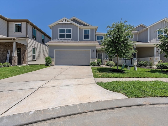 14506 Sweet Cherry Dr, Houston, TX 77069 - craftsman-style home with board and batten siding, a garage, concrete driveway, and a front yard