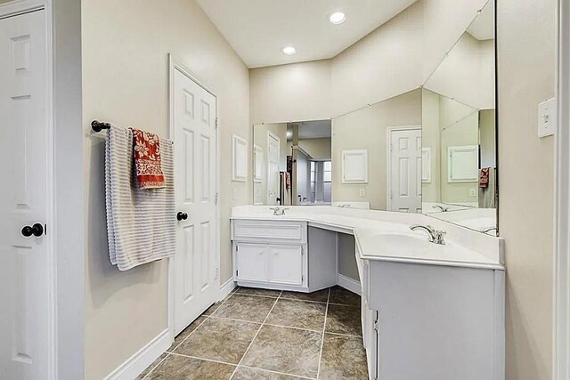 15538 Pine Valley Trl, Cypress, TX 77433 - full bathroom featuring double vanity, baseboards, recessed lighting, and tile patterned floors
