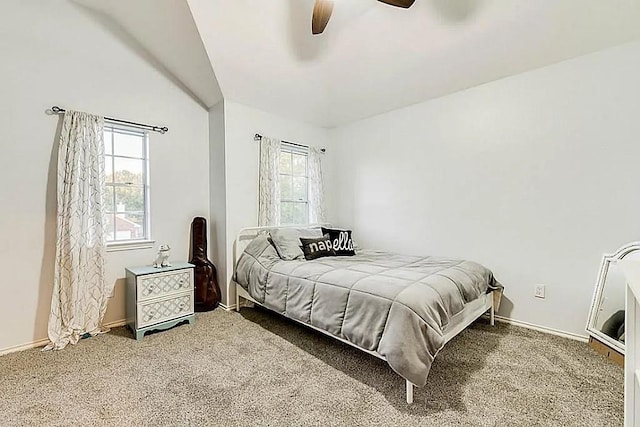15538 Pine Valley Trl, Cypress, TX 77433 - bedroom with multiple windows, carpet flooring, baseboards, and ceiling fan