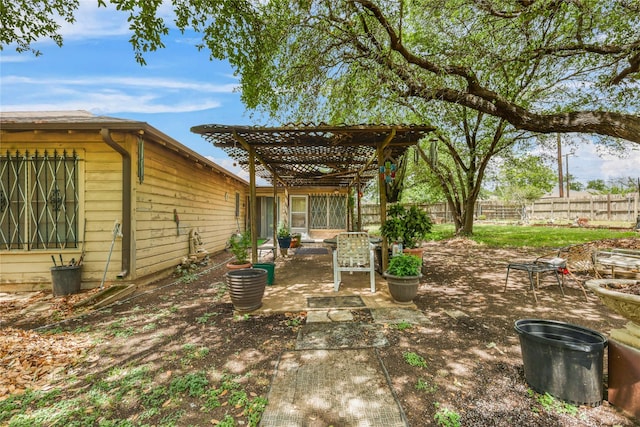 2316 Cleveland Ave, Waco, TX 76706 - fenced backyard featuring a patio and a pergola