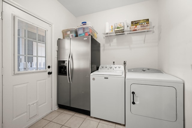 3233 Greenhead St, Katy, TX 77493 - laundry room featuring independent washer and dryer and light tile patterned floors