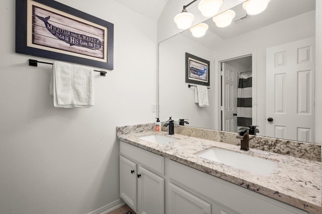 3233 Greenhead St, Katy, TX 77493 - bathroom with double vanity and baseboards