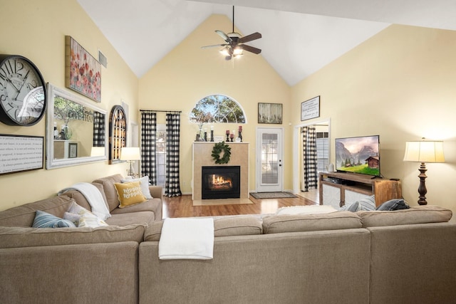3233 Greenhead St, Katy, TX 77493 - living area with wood finished floors, ceiling fan, a fireplace, and high vaulted ceiling