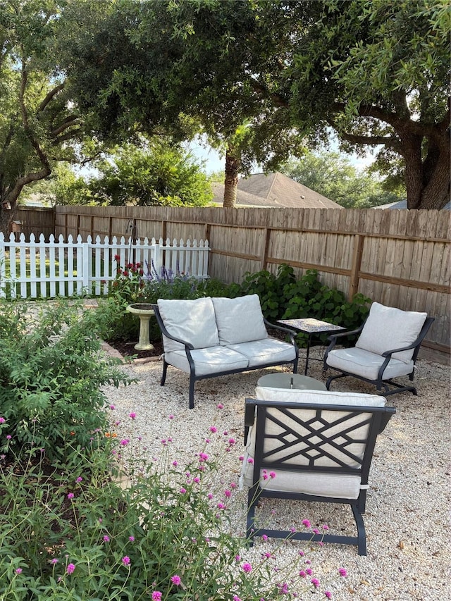 3233 Greenhead St, Katy, TX 77493 - fenced backyard with a patio and an outdoor living space