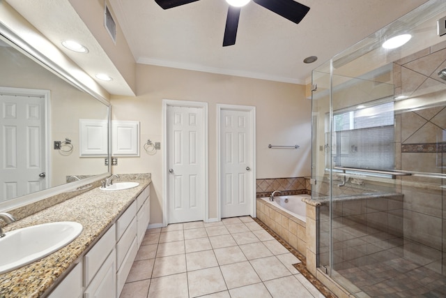 bathroom featuring a ceiling fan, ornamental molding, a garden tub, a stall shower, and tile patterned flooring