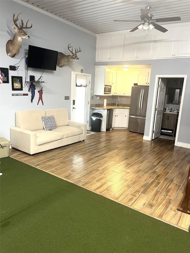 202 Golfview Dr, Normangee, TX 77871 - living room featuring dark wood-style flooring and a ceiling fan