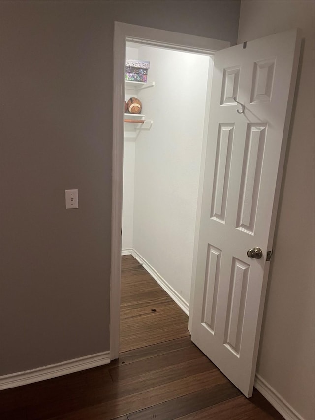 202 Golfview Dr, Normangee, TX 77871 - hall with baseboards and dark wood-style floors